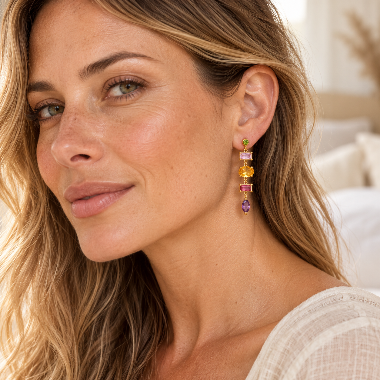 
                  
                    Gold & Multicolour crystal cascade earrings on model; illustrative fit
                  
                