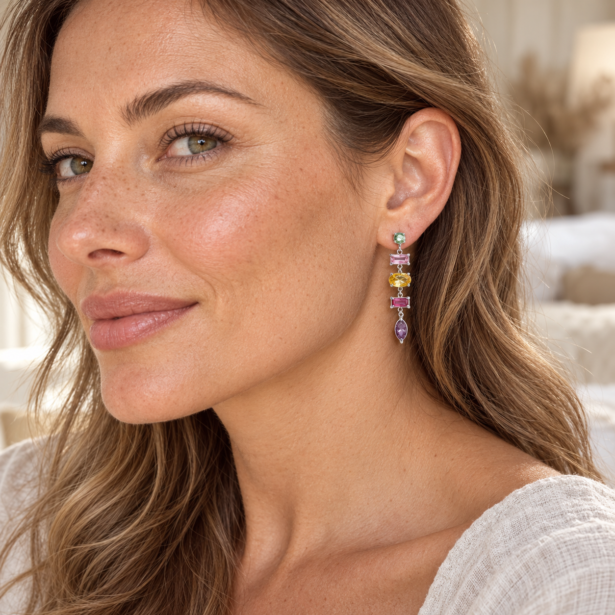 
                  
                    Silver & Multicolour crystal cascade earrings on model; illustrative fit
                  
                