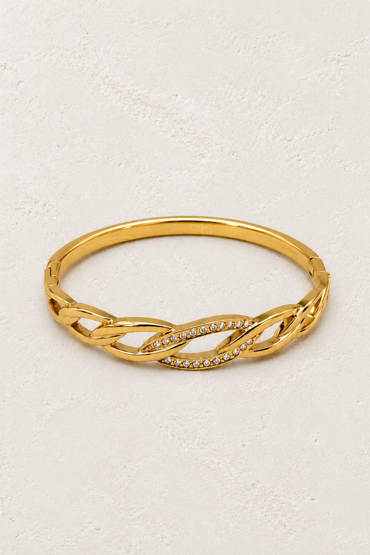 Celeste Gold Crystal Link Bangle on Boho & Mala's ivory plaster background