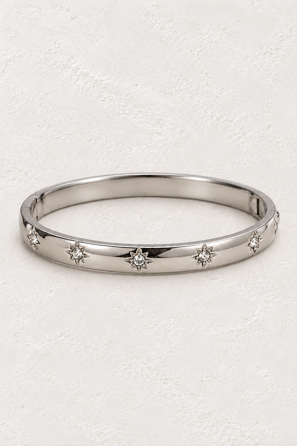 
                  
                    Celestia Silver Starburst Bangle — approved off-white background 2:3 cover
                  
                