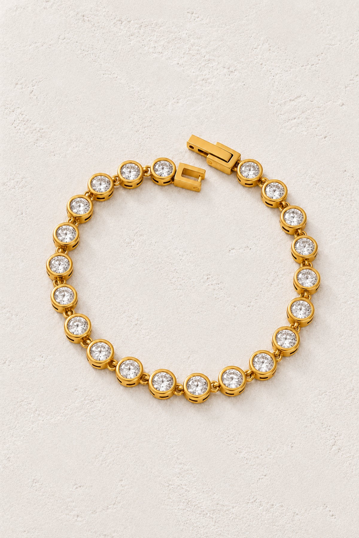 Celestial Gold Crystal Tennis Bracelet on Boho & Mala's ivory plaster background