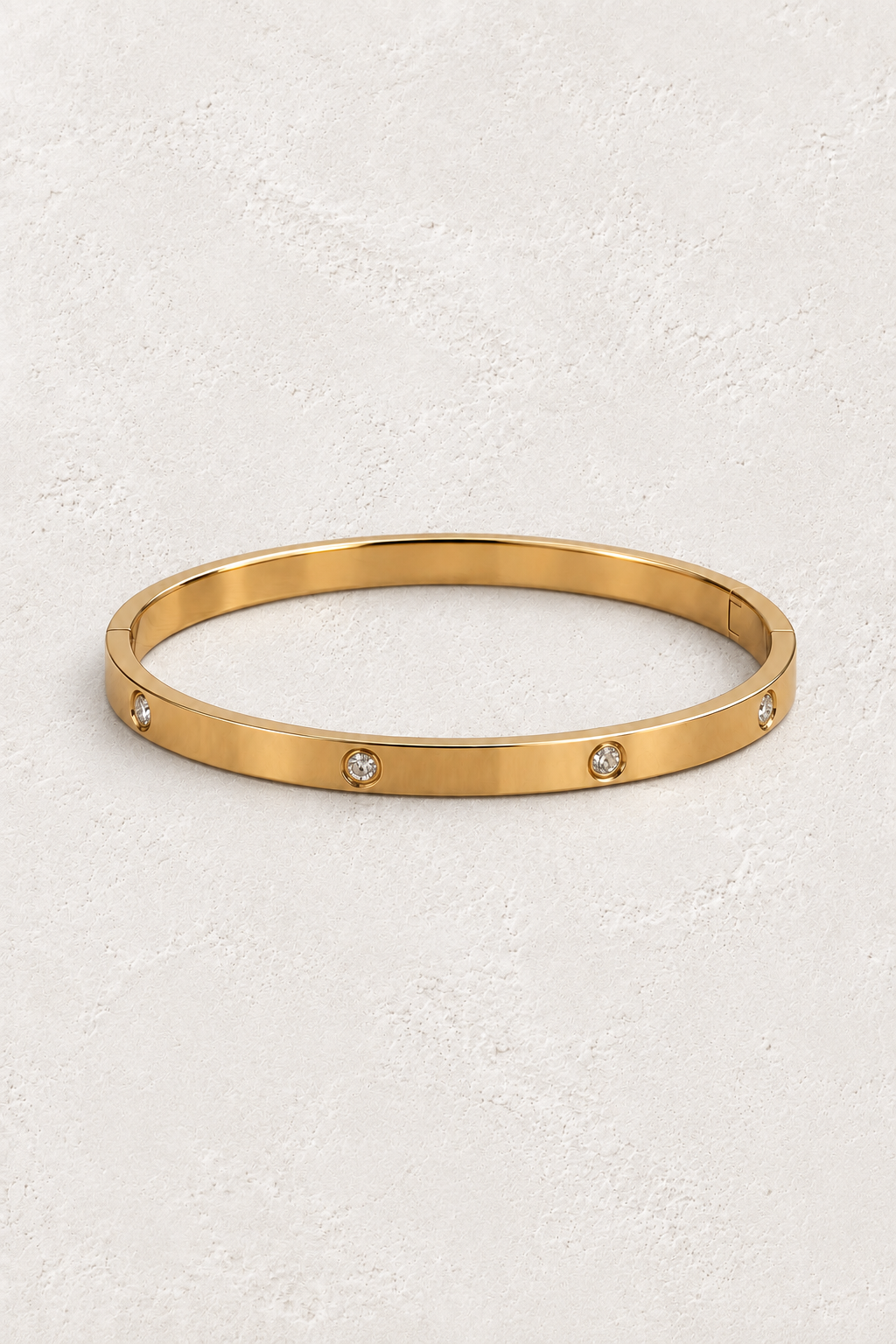
                  
                    Celine Gold Scattered Crystal Bangle — approved off-white background 2:3 cover
                  
                