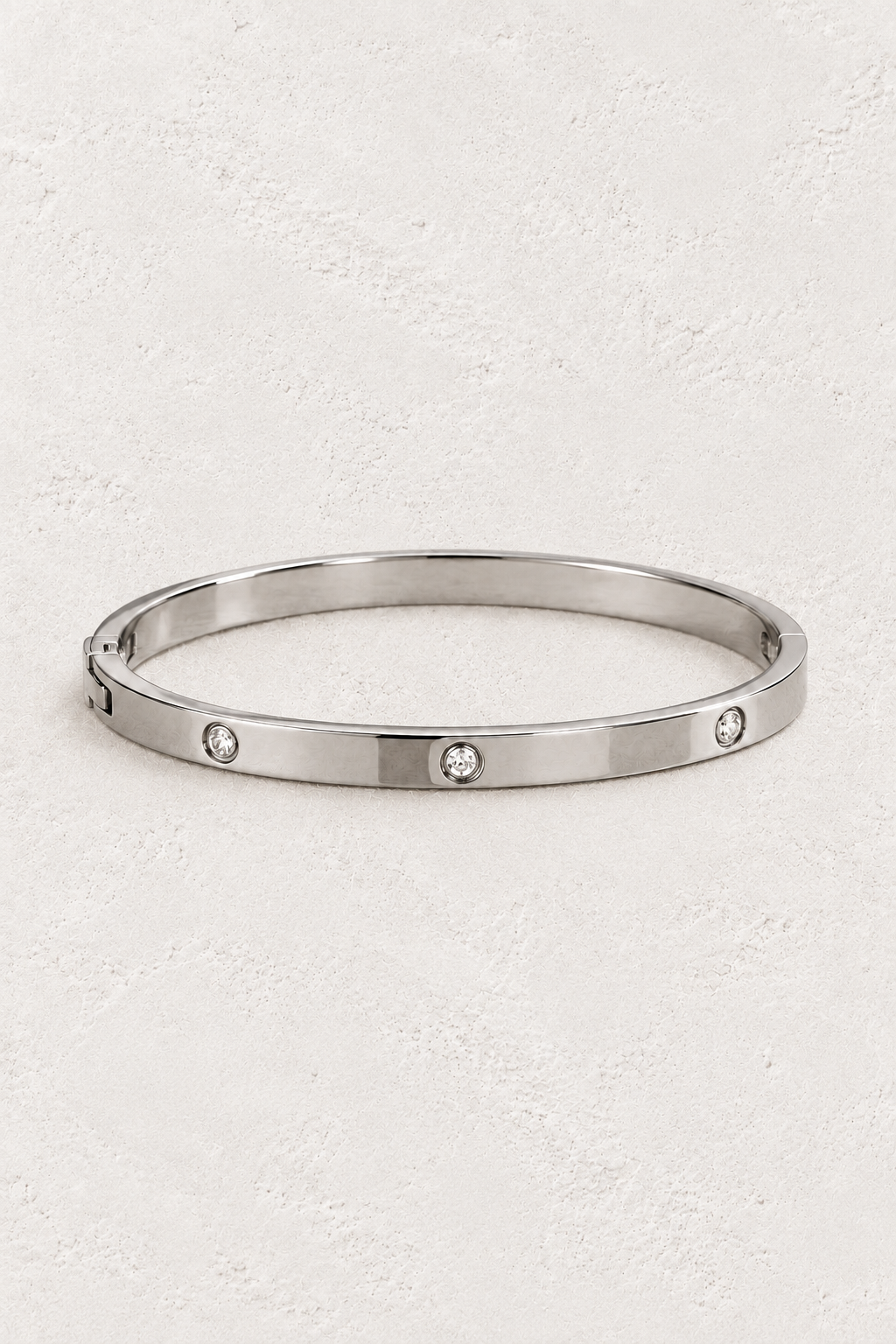 
                  
                    Celine Silver Scattered Crystal Bangle — approved off-white background 2:3 cover
                  
                