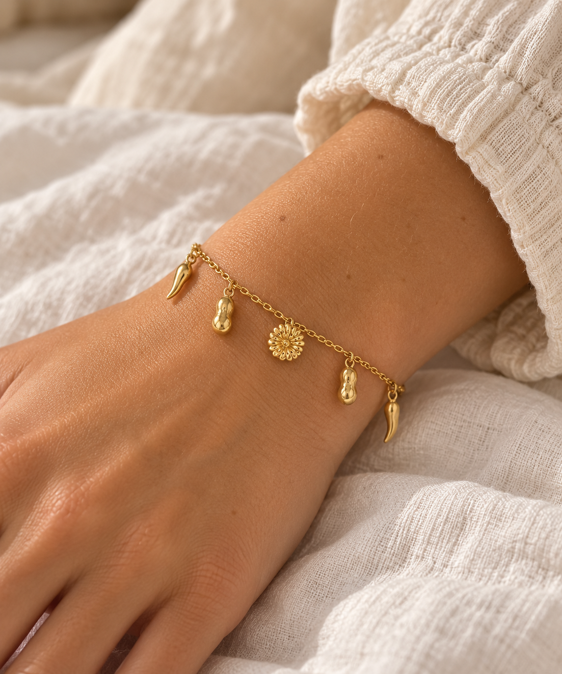Sunflower & Charm Chain Bracelet – Gold on wrist – AI styling illustration