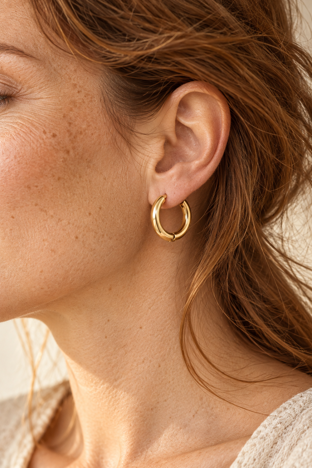 Model wearing Classic Waterproof Hoop Earrings – Gold 9mm