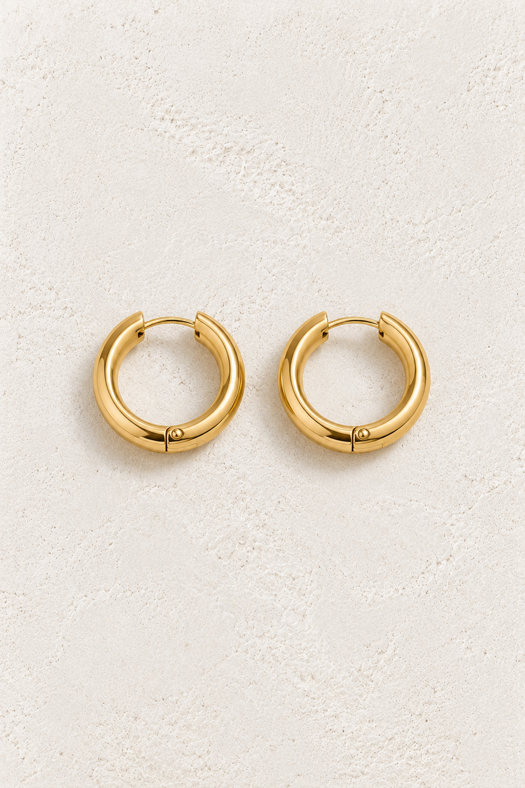 
                  
                    Classic Waterproof Hoop Earrings Gold 14mm on cream textured background
                  
                