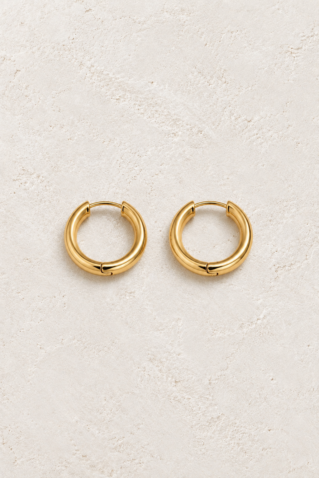 
                  
                    Classic Waterproof Hoop Earrings Gold 16mm on cream textured background
                  
                