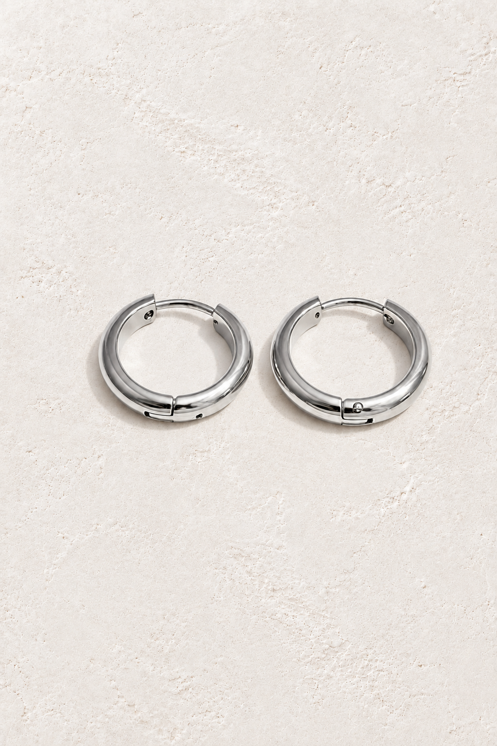 Classic Waterproof Hoop Earrings – Silver 16mm on Boho & Mala textured background