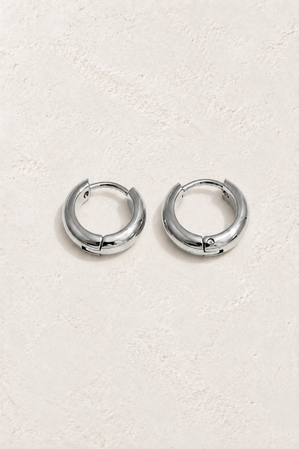 Classic Waterproof Hoop Earrings – Silver 9mm on Boho & Mala textured background