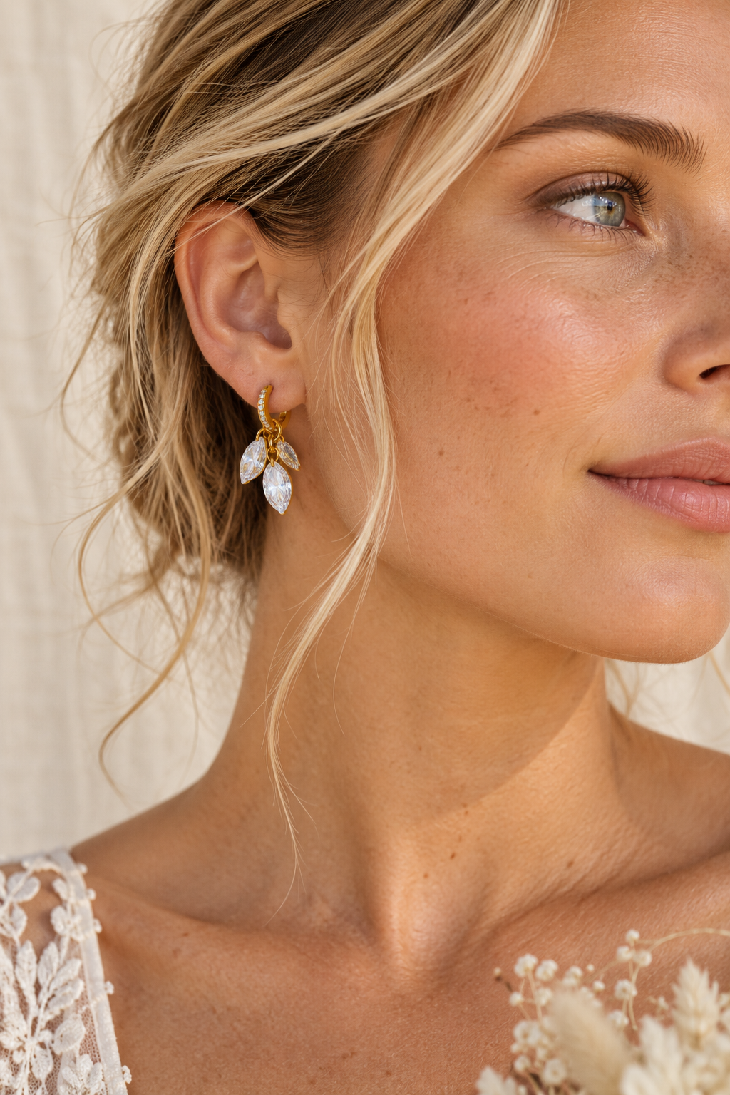 Gold Crystal Cluster Drop Hoop Earrings worn on model