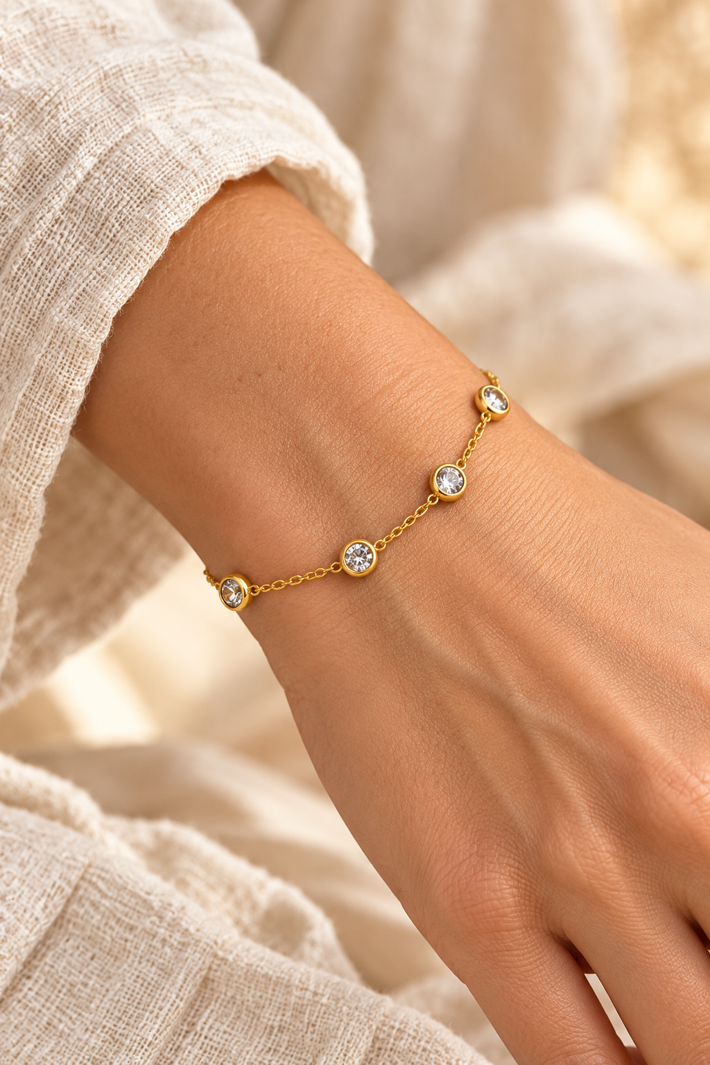 Crystal Station Gold Bracelet worn on a model's wrist