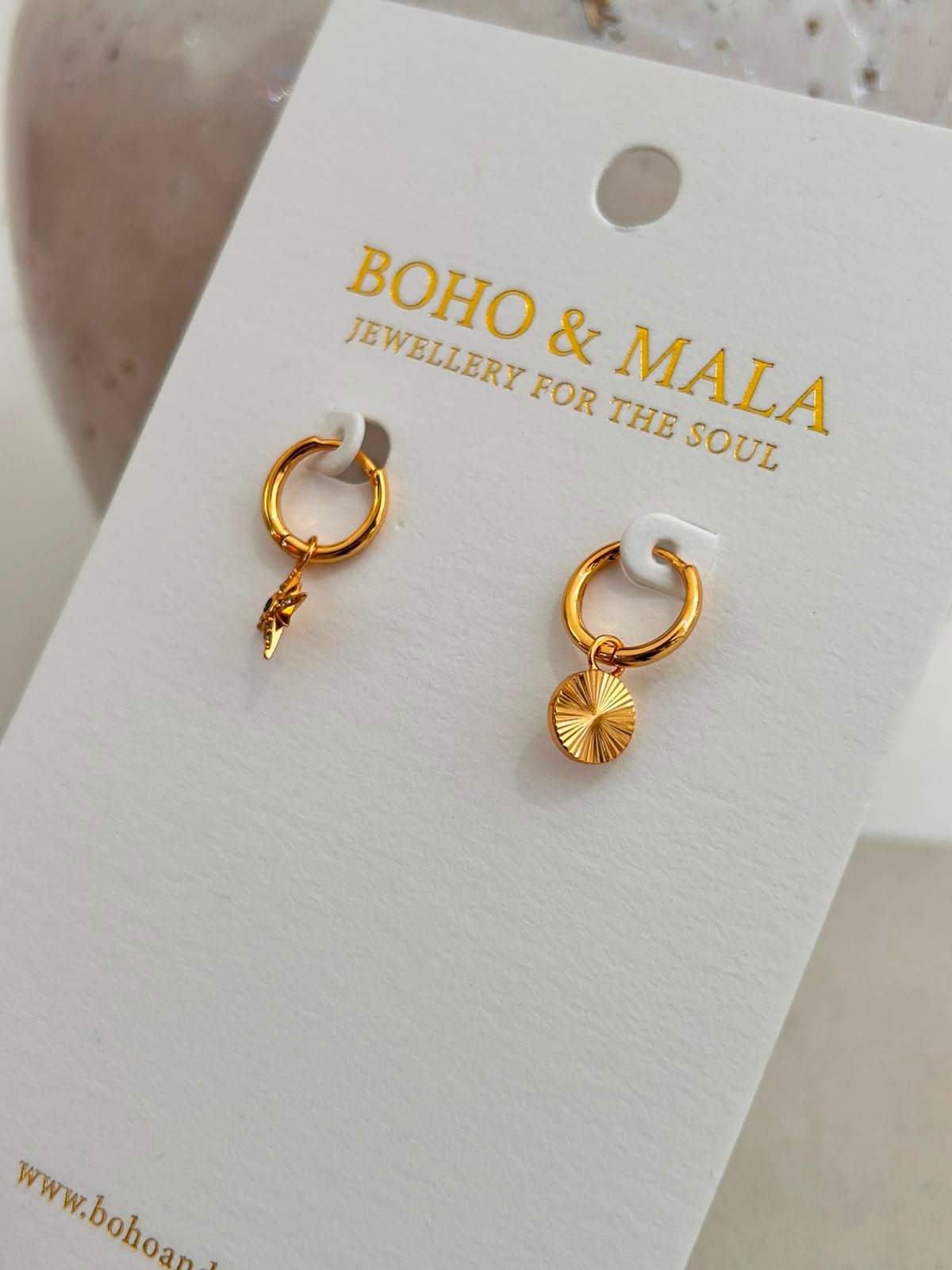
                  
                    Celeste Sun & Star Huggie Earrings
                  
                