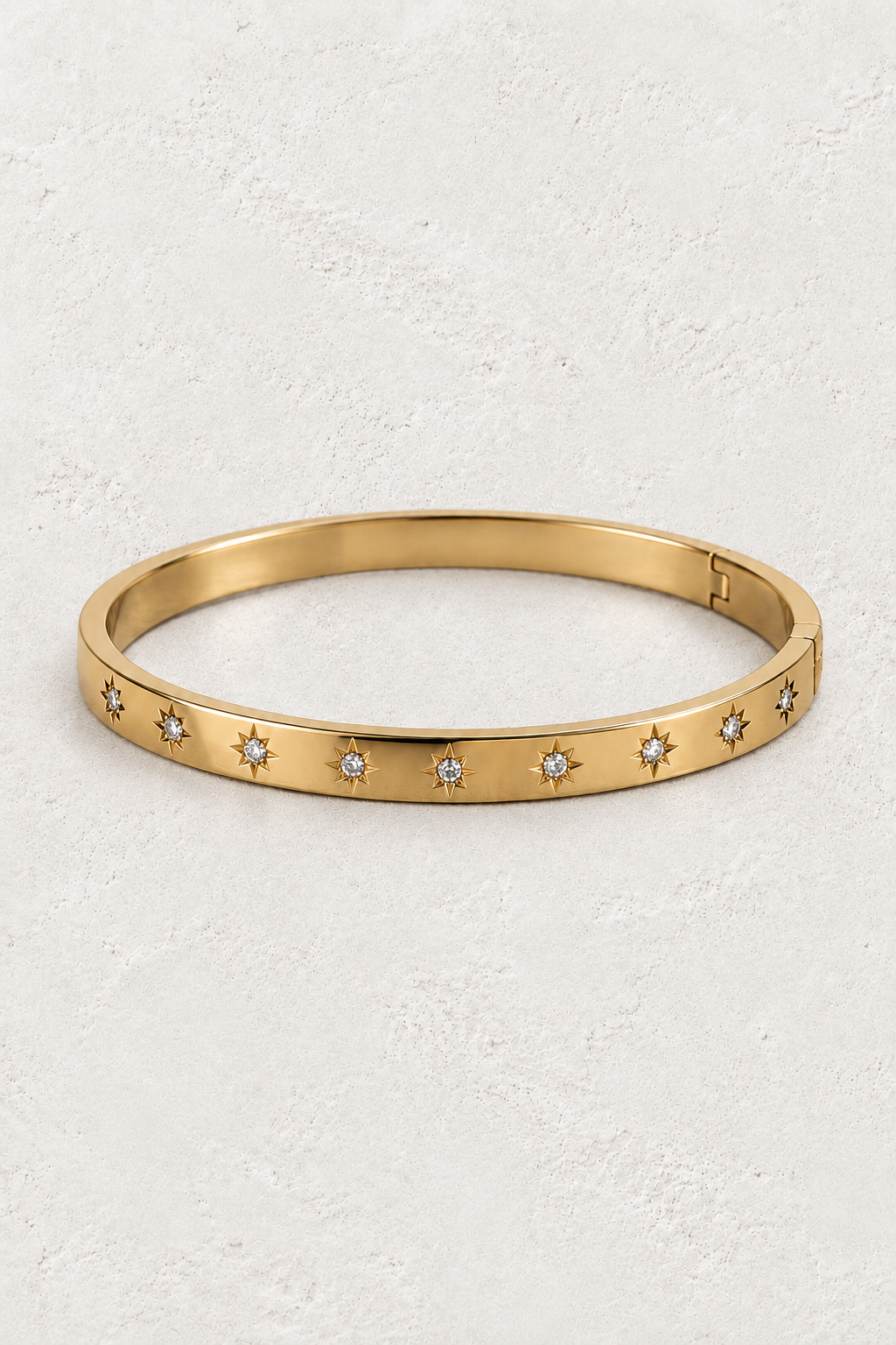 
                  
                    Estelle Gold Starlight Bangle — approved off-white background 2:3 cover
                  
                