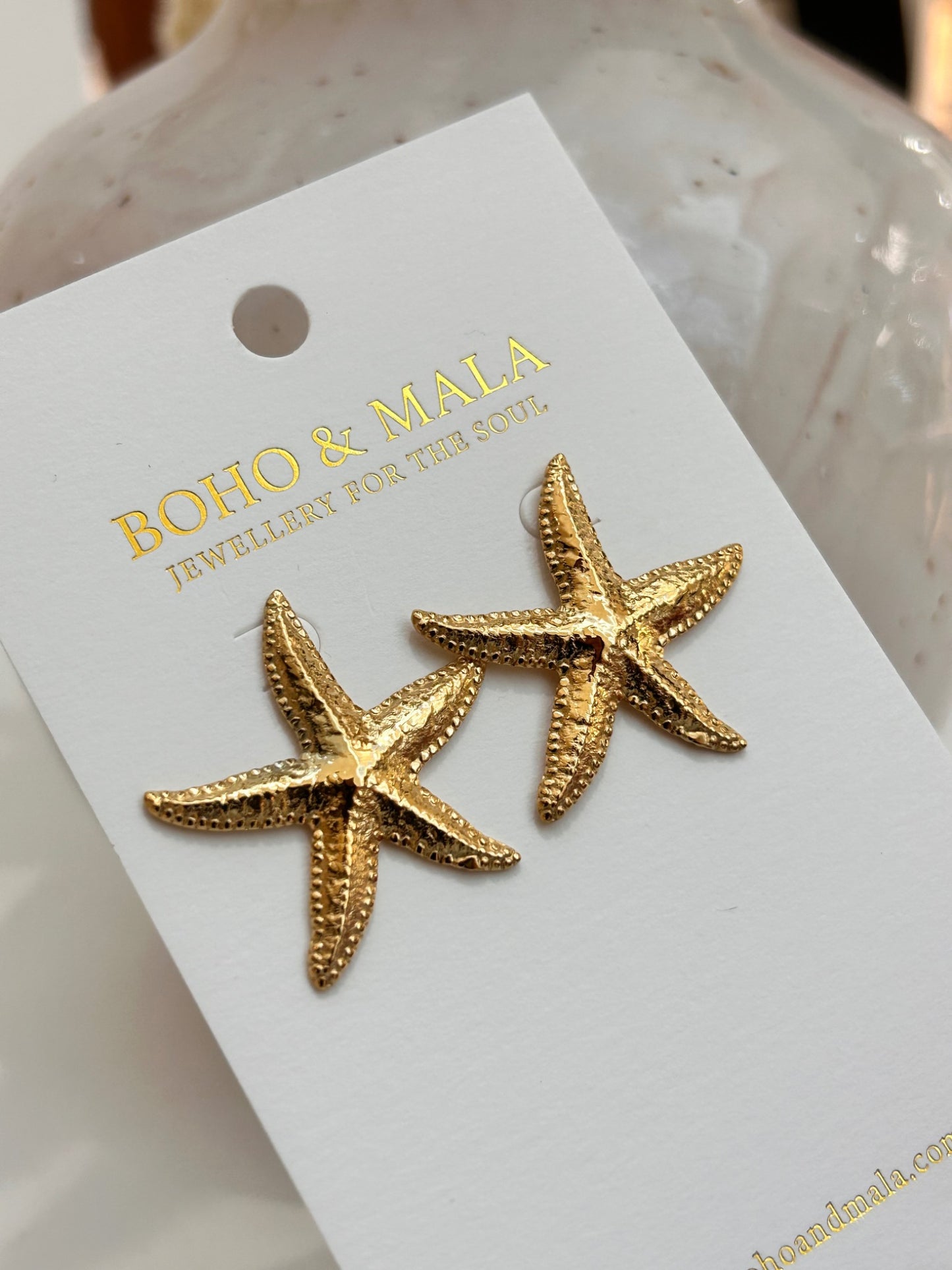 
                  
                    Estelle Starfish Studs on Boho & Mala display card
                  
                