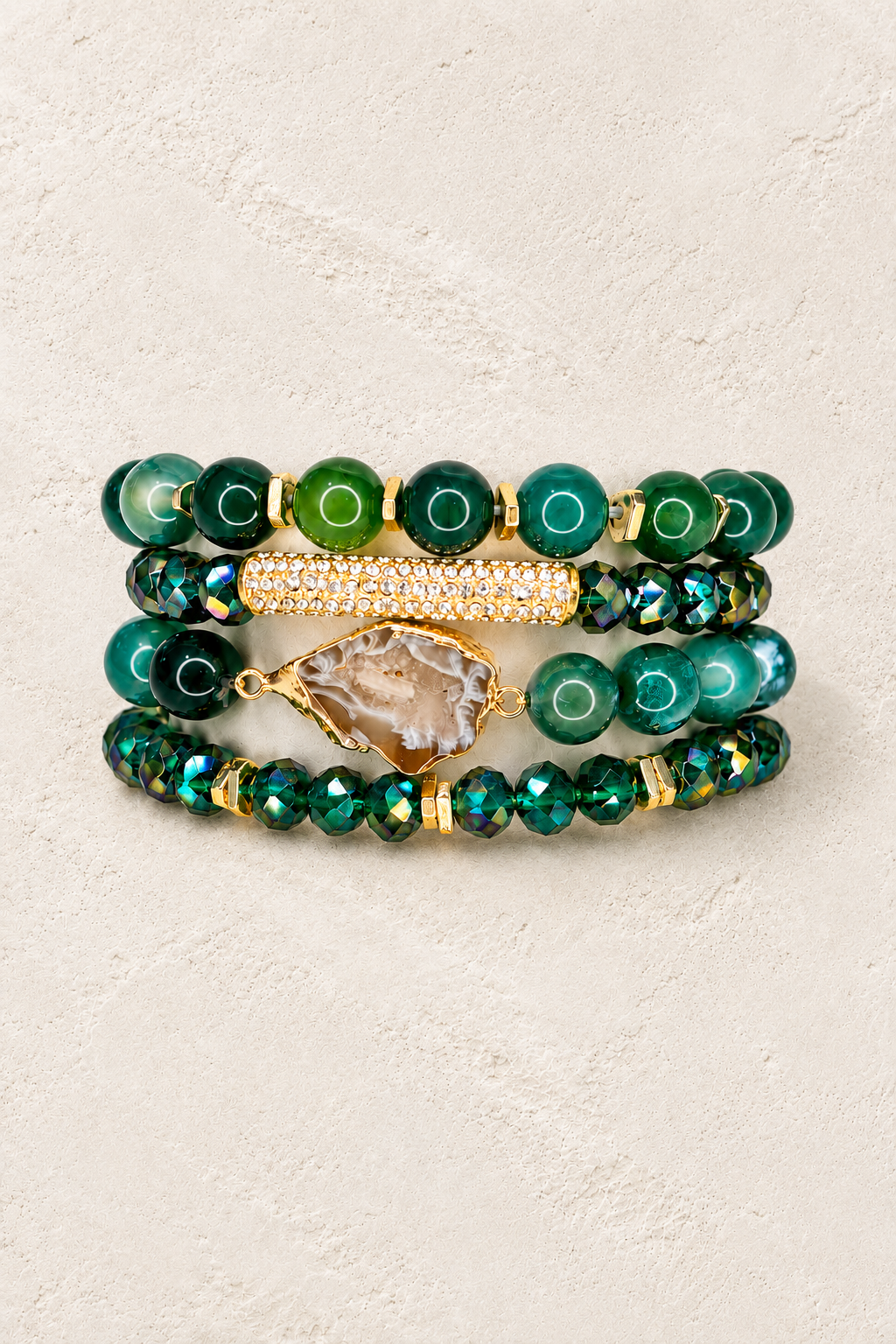 
                  
                    Evergreen Stone Mix Elastic Bracelet Stackable Sets on cream beige textured background
                  
                