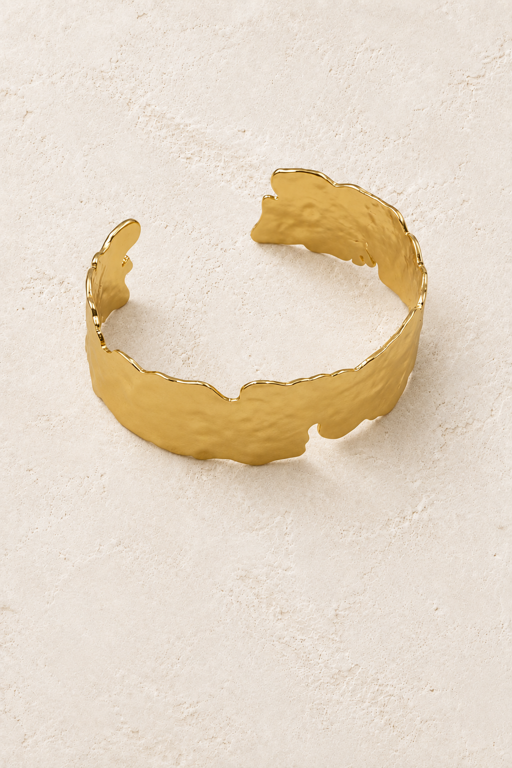 
                  
                    Free Spirit Adjustable Statement Boho Brass Gold Cuff Bracelet Large on cream beige textured background
                  
                