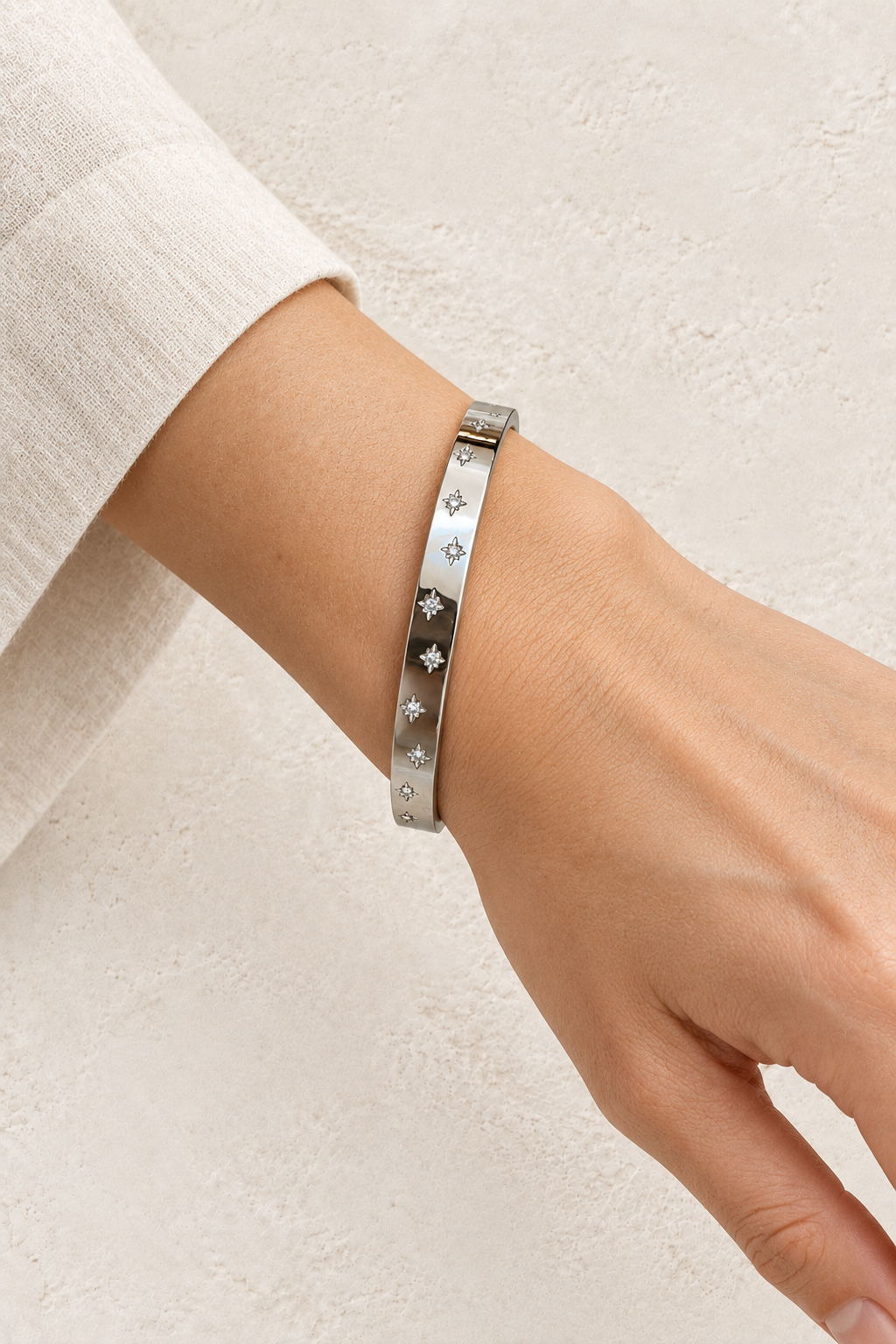 
                  
                    Model wearing Silver Starburst Crystal Bangle | Waterproof
                  
                