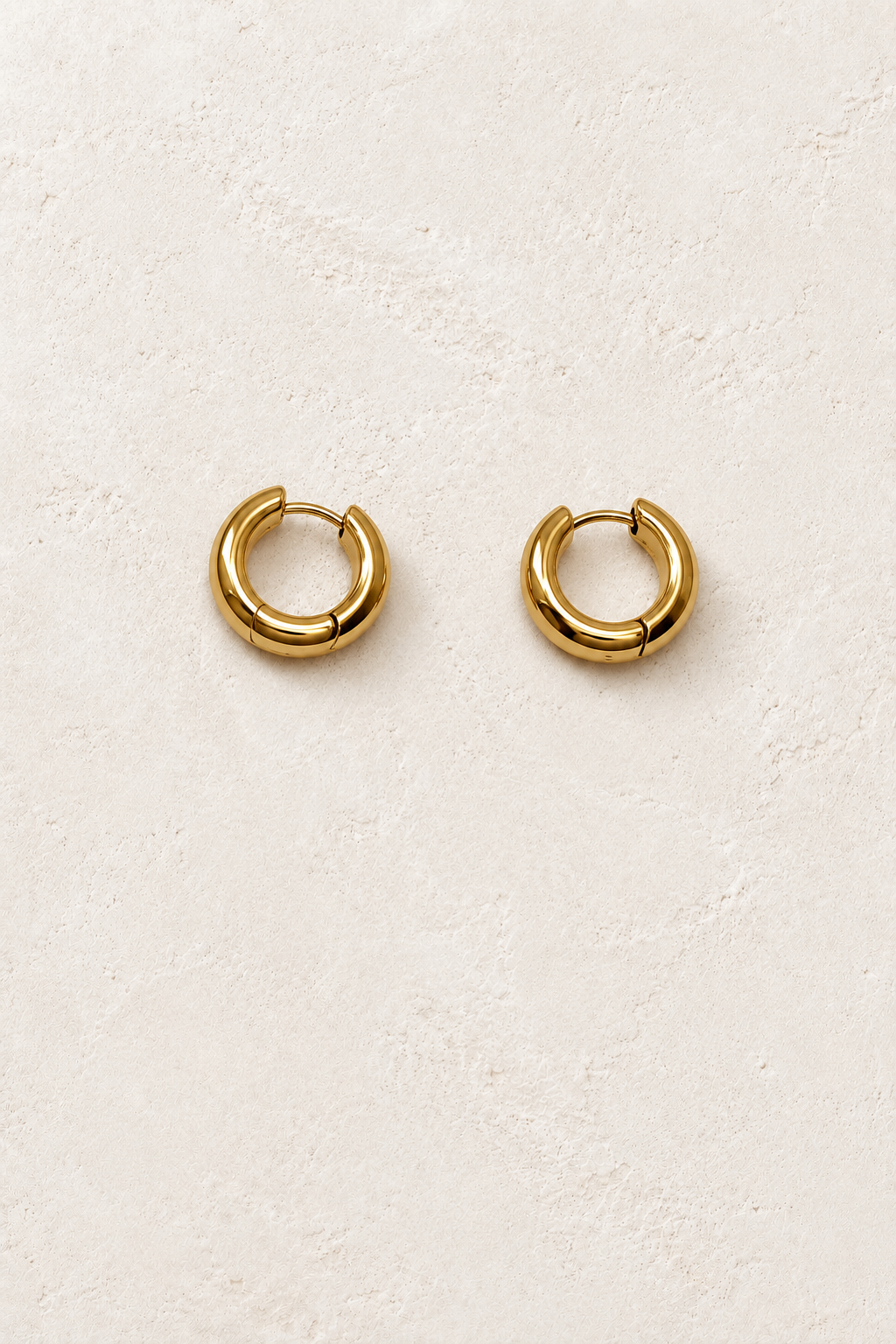 
                  
                    Gold 7mm – Slim Classic Waterproof Hoop Earrings on cream plaster background
                  
                