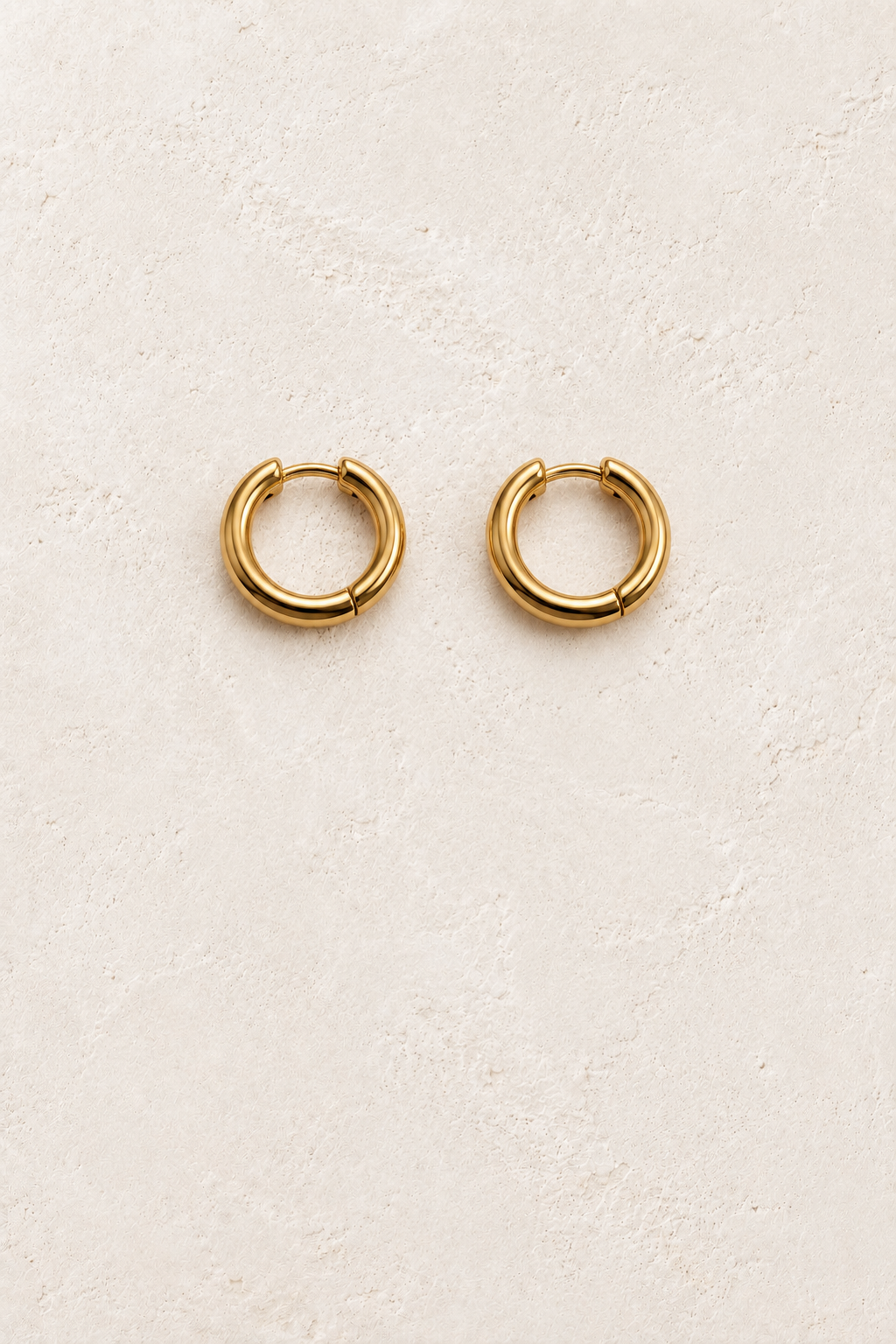 
                  
                    Gold 9mm – Slim Classic Waterproof Hoop Earrings on cream plaster background
                  
                