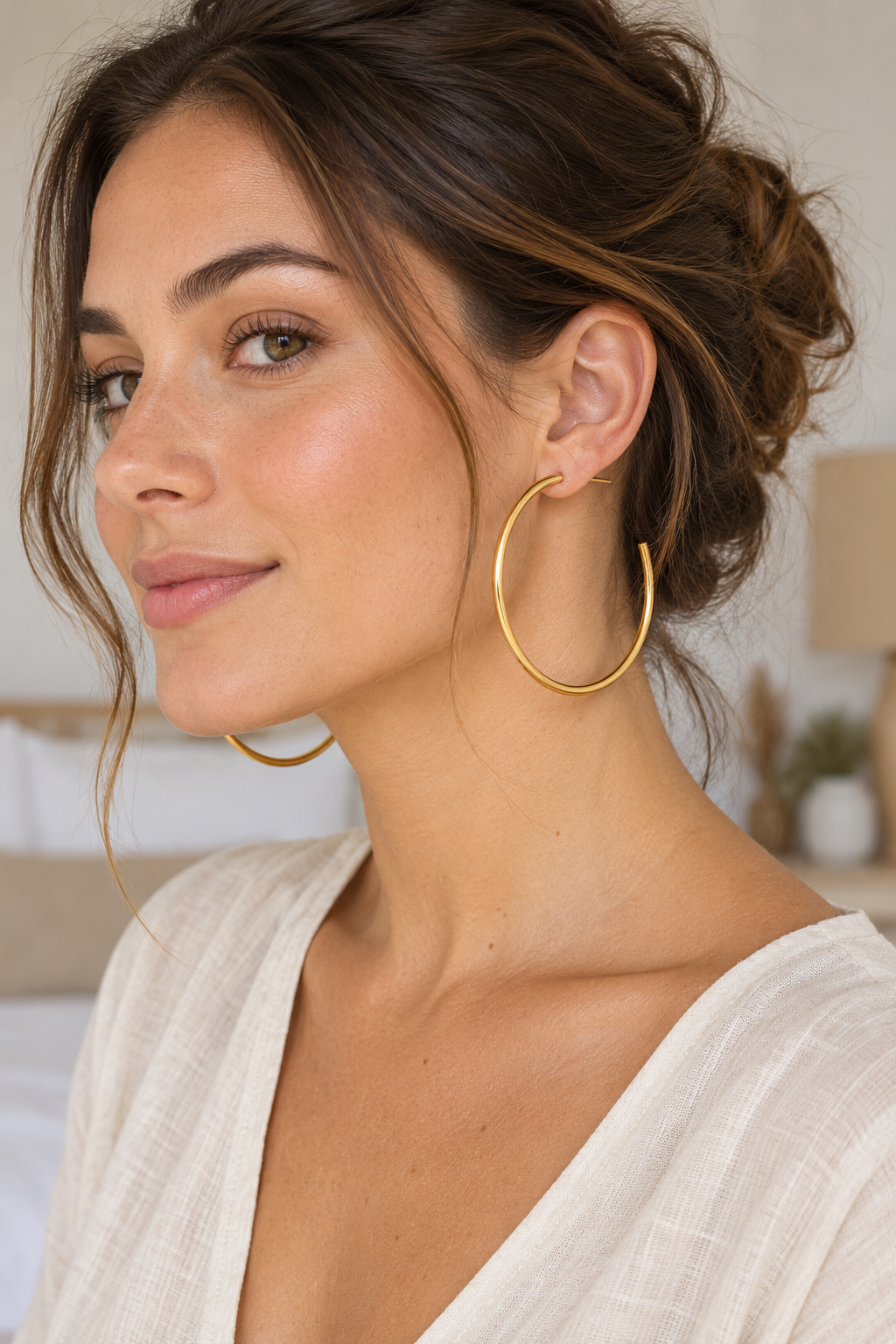 
                  
                    Gold Classic Hoop Earrings 70mm — model
                  
                