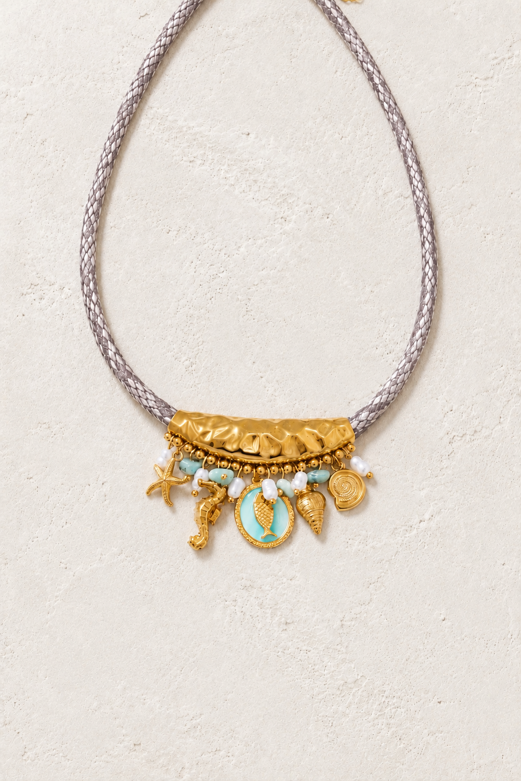 Bohemia Charm Bar Necklace on the Boho & Mala cream stone hero background