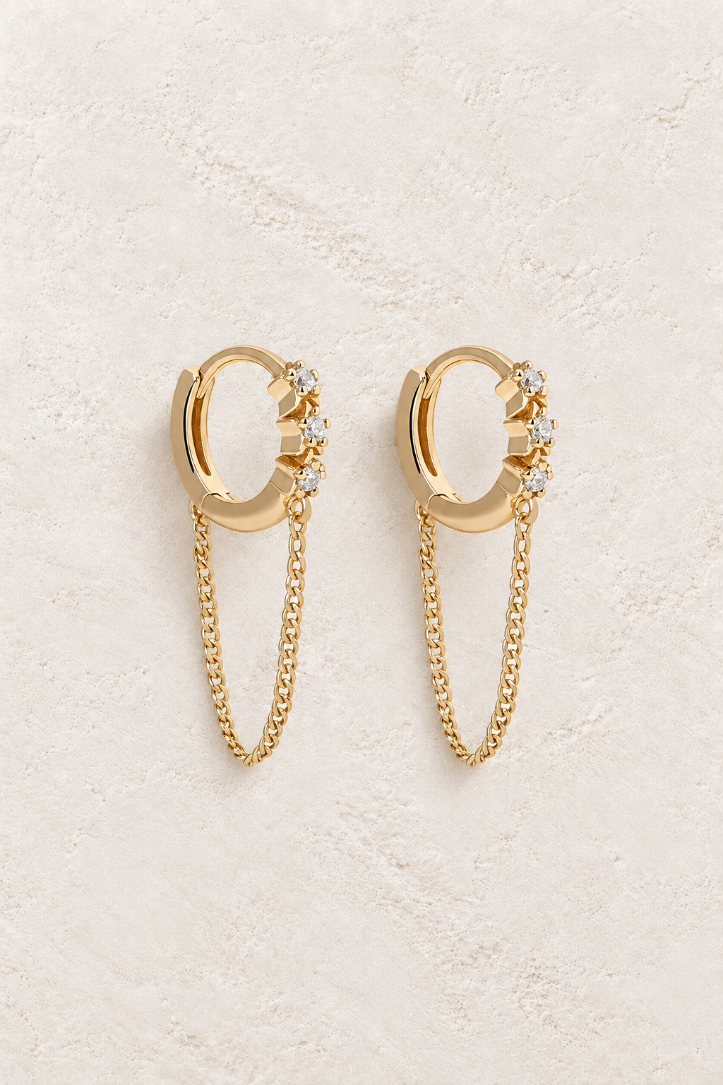Gold Plated Sterling Silver Dainty Minimalist Hypoallergenic Hoop Earrings- Boho Jewellery For Wild Souls on warm ivory textured background