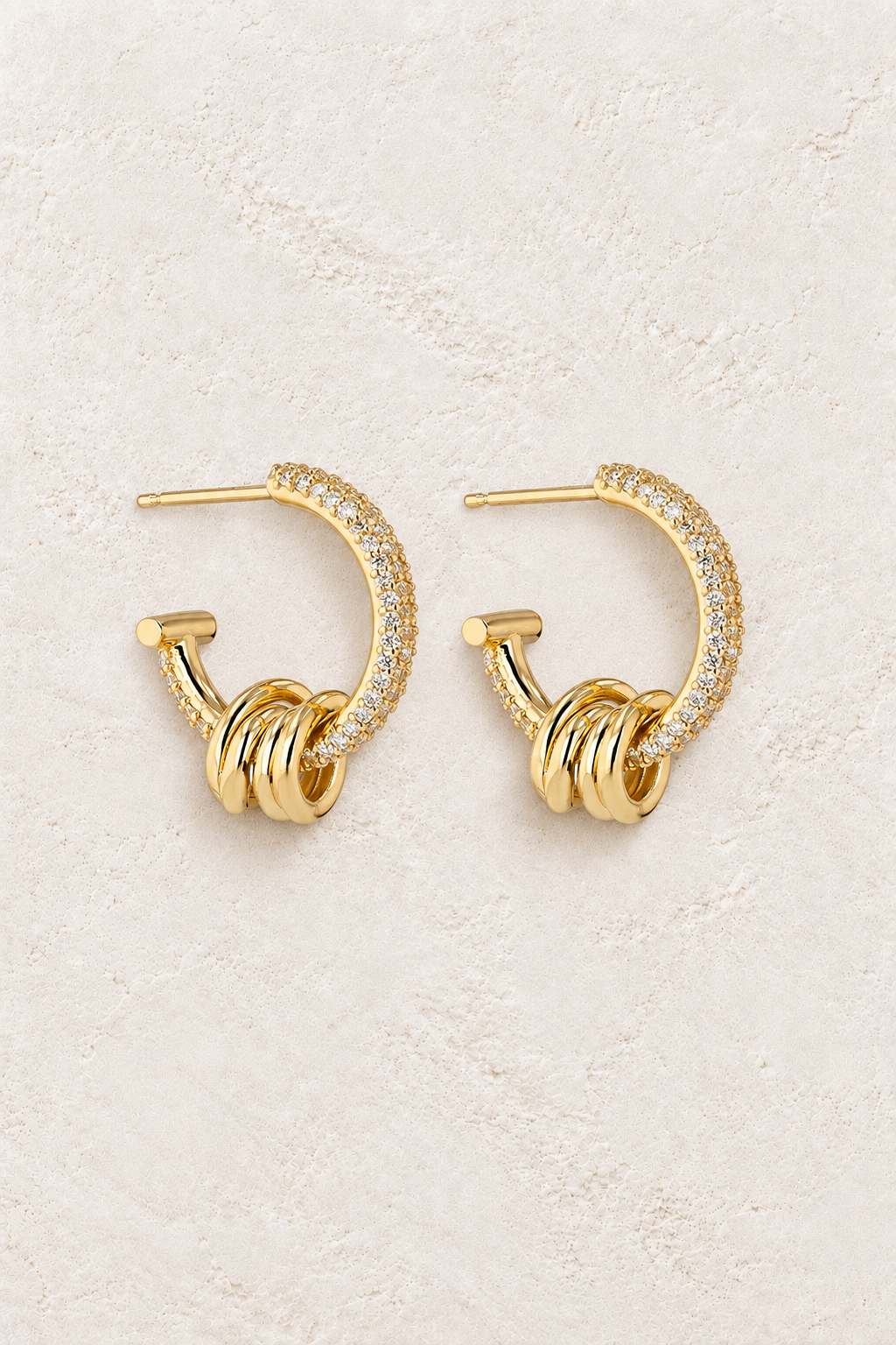 Gold Plated Sterling Silver Dainty Minimalist Hypoallergenic Hoop Earrings- Boho Jewellery For Wild Souls on warm ivory textured background