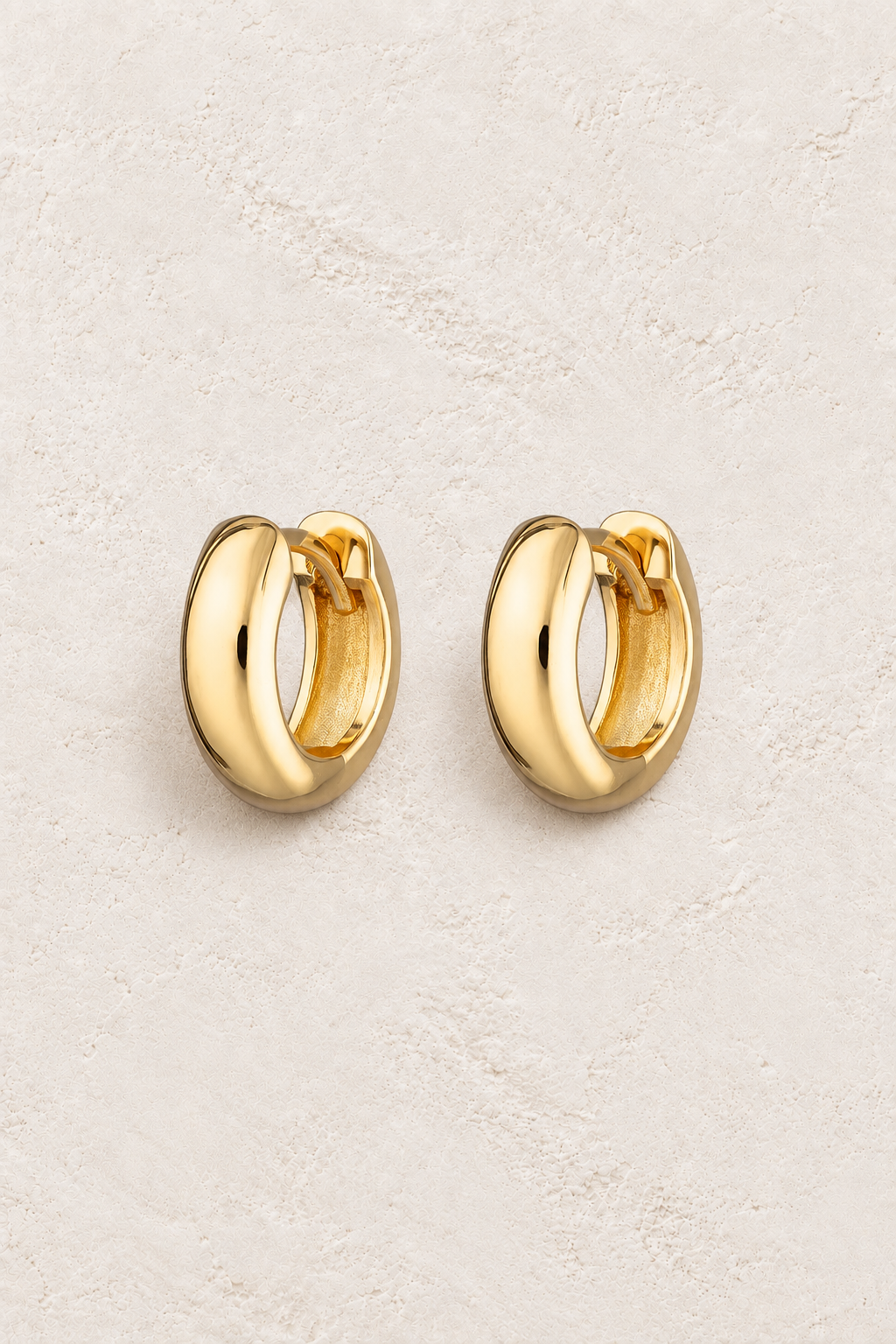 Gold Plated Sterling Silver Dainty Minimalist Hypoallergenic Hoop Earrings- Boho Jewellery For Wild Souls on warm ivory textured background