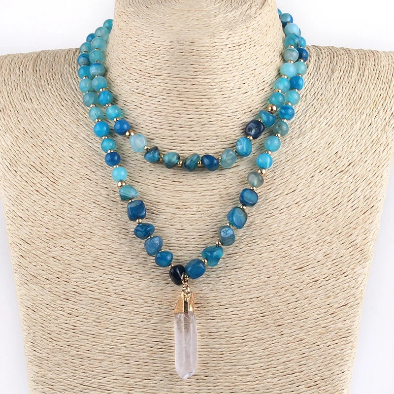 
                  
                    Blue Double Tribal Stone Necklace worn on a model
                  
                