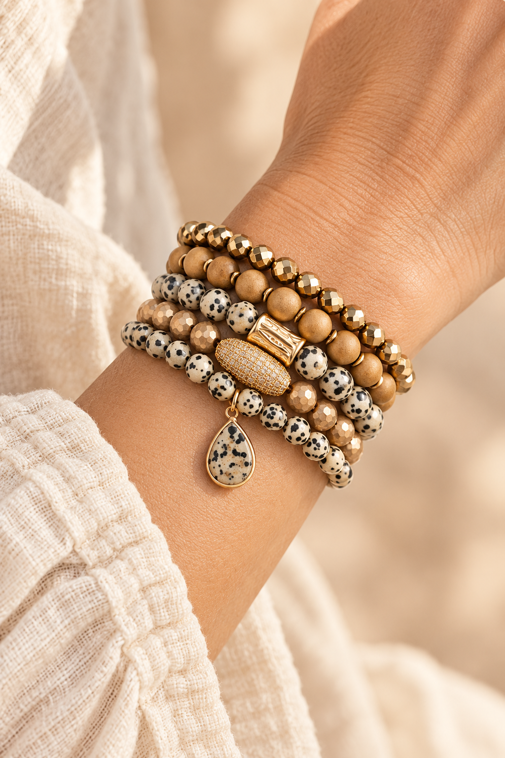 
                  
                    Jasper Stone Necklace & Bracelet Set worn on a model's wrist
                  
                
