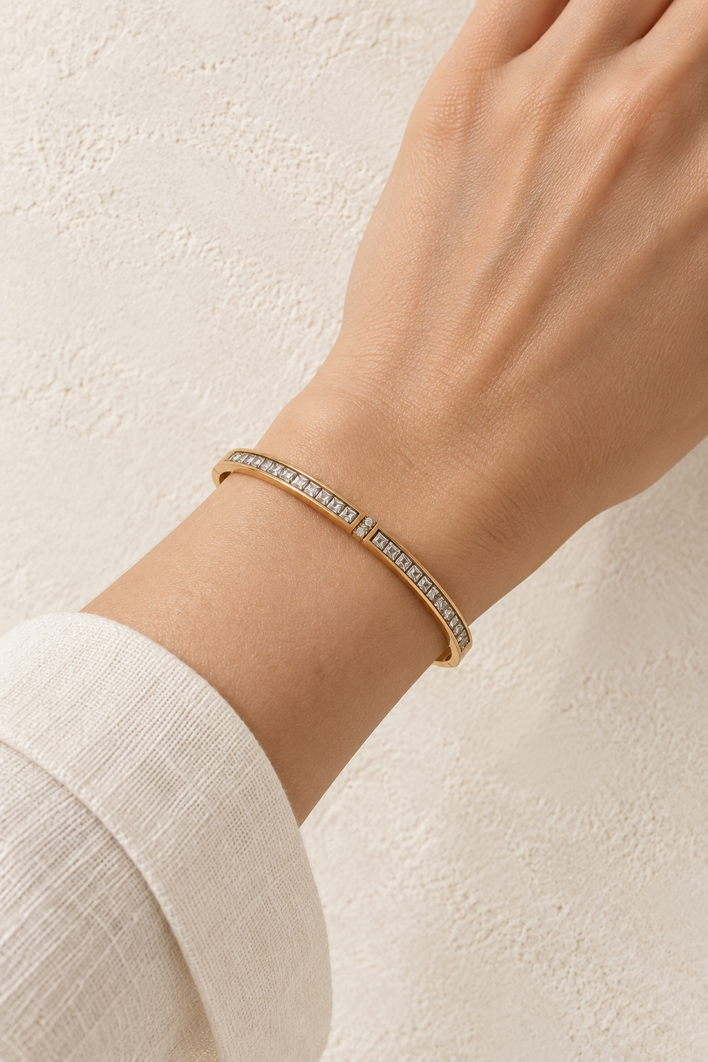 Model wearing Liora Gold Delicate Crystal Bangle