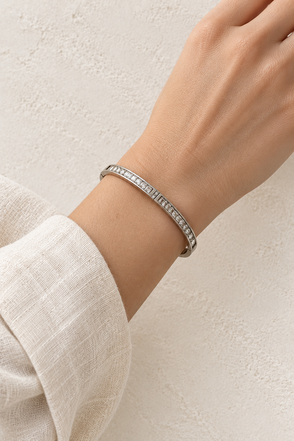 Model wearing Liora Silver Delicate Crystal Bangle