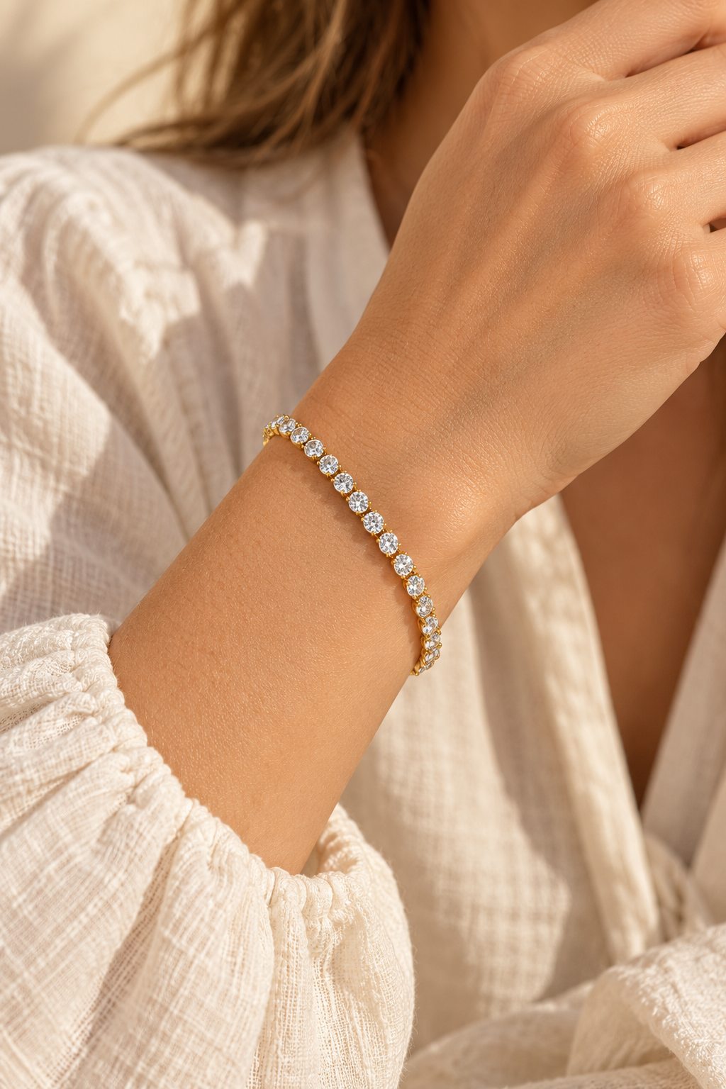 Luciana Gold Classic Crystal Tennis Bracelet worn on a model's wrist