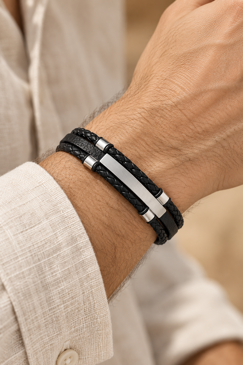 Men’s Black PU Leather & Stainless-Steel Bracelet 22cm worn on a model's wrist