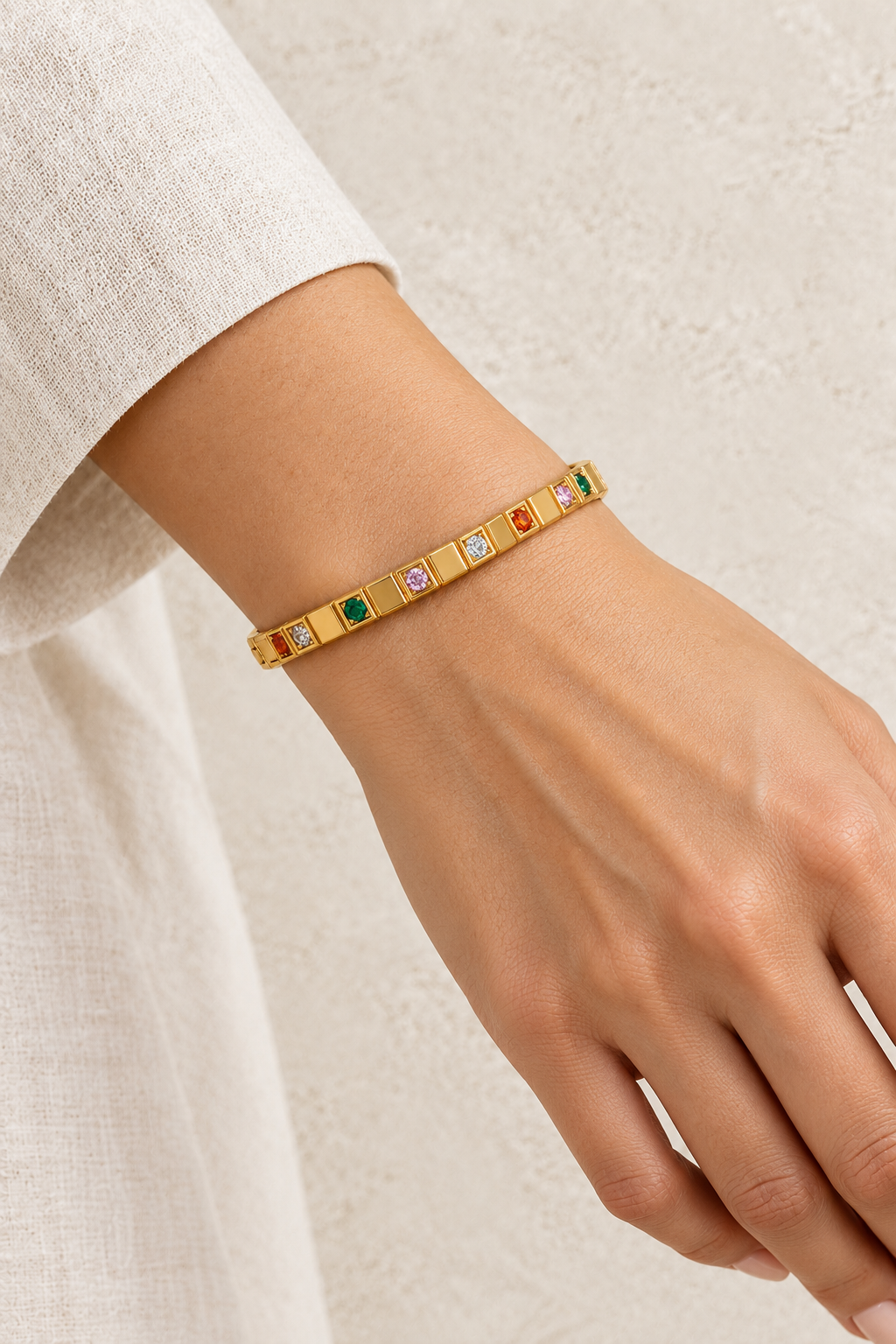 Model wearing Mira Gold Multicolour Crystal Bangle