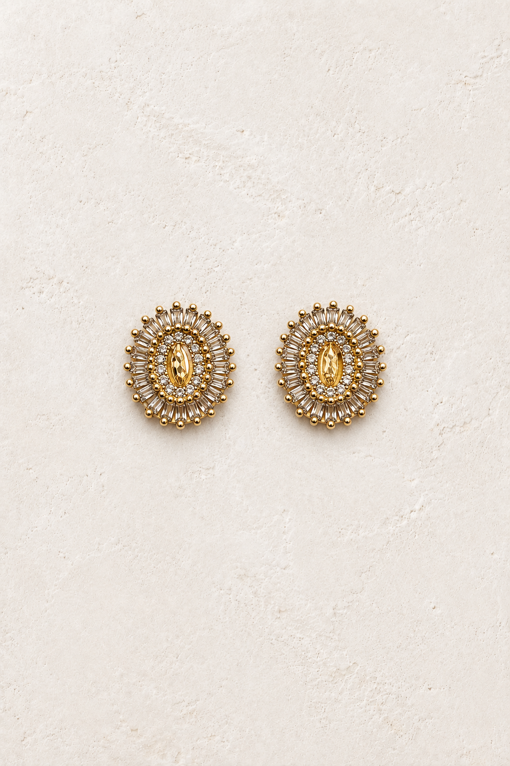 Mireya Crystal Halo Stud Earrings on cream textured background