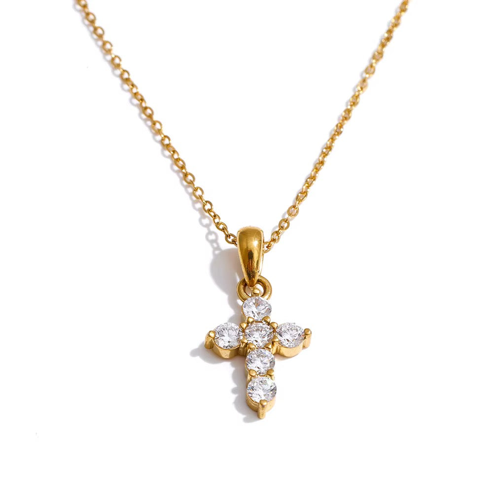 
                  
                    Gold petite cross original product photograph
                  
                