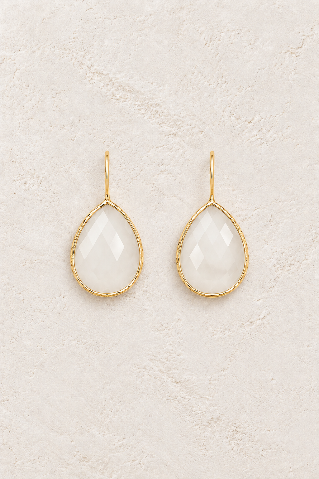 Roseali Earrings on warm ivory textured background