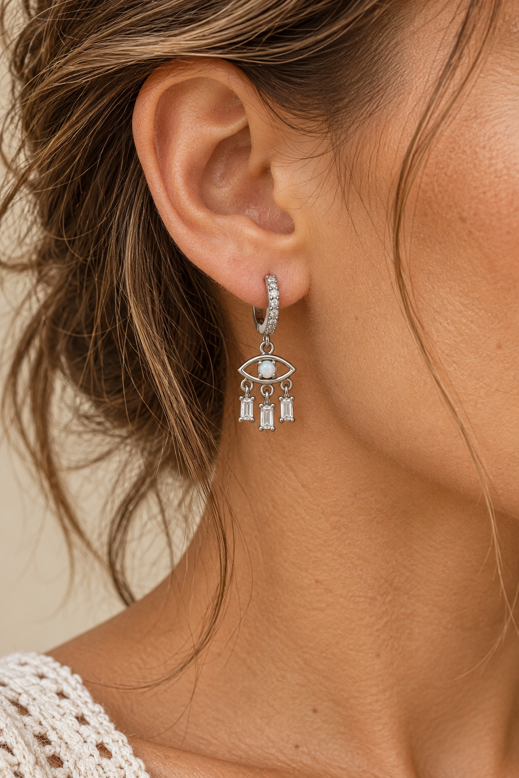 
                  
                    Safira sterling silver opal evil eye earrings on boho chic model, 22mm drop with cubic zirconia details
                  
                