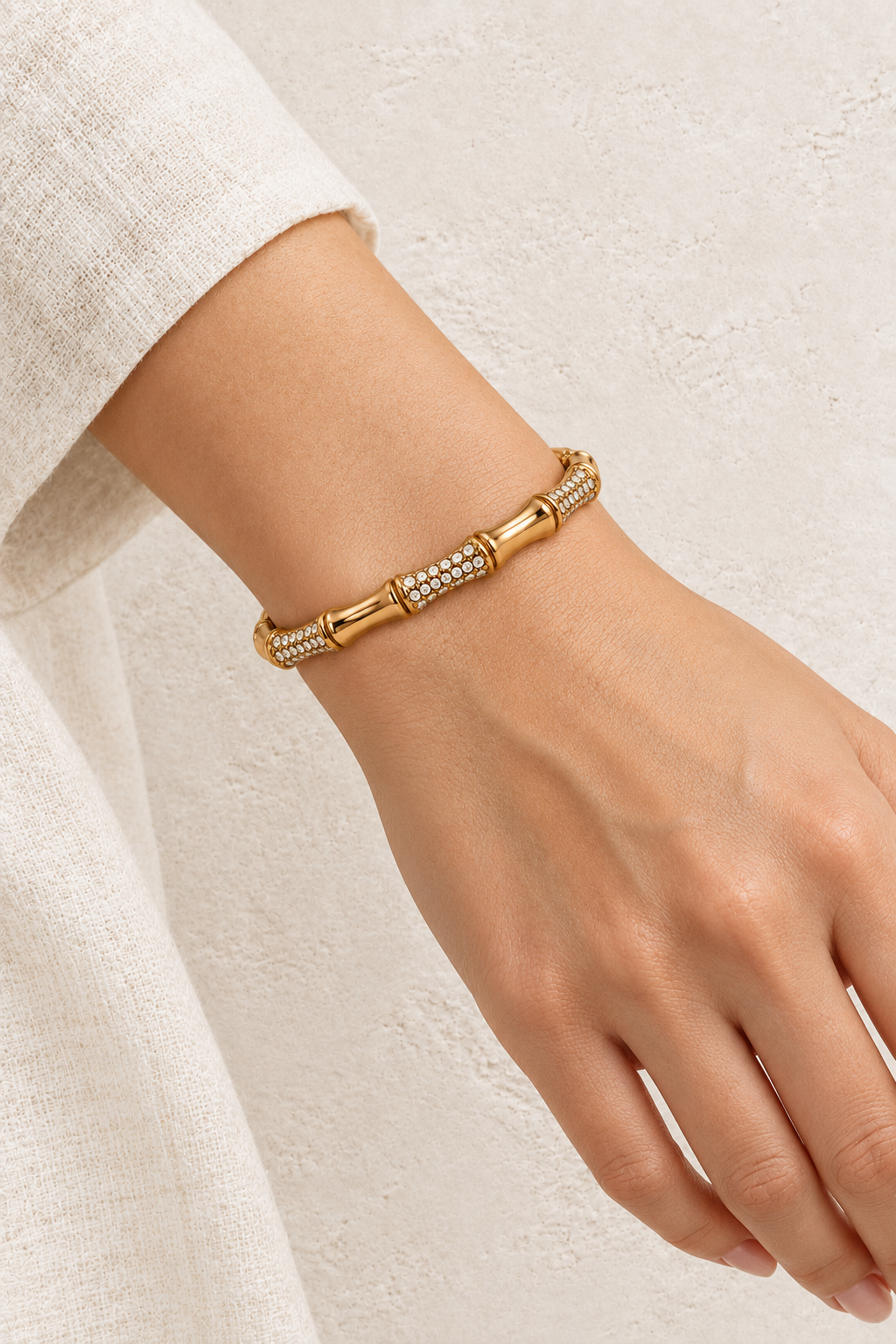 Model wearing Serina Gold Ornate Crystal Bangle