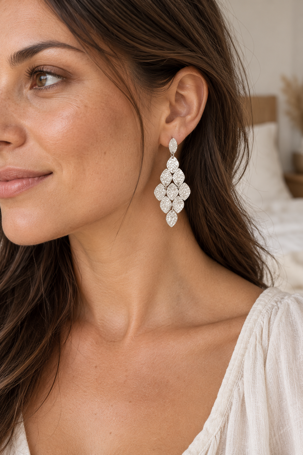 Hammered Petal Chandelier Earrings – Silver worn on model; illustrative fit