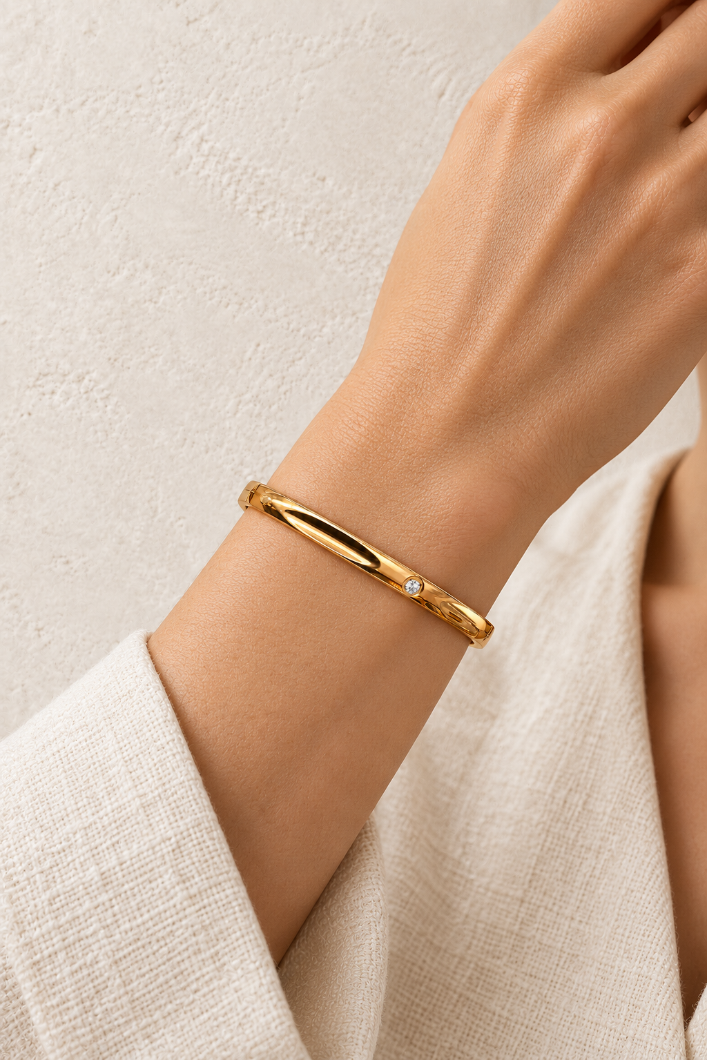 Model wearing Sola Gold Solitaire Bangle