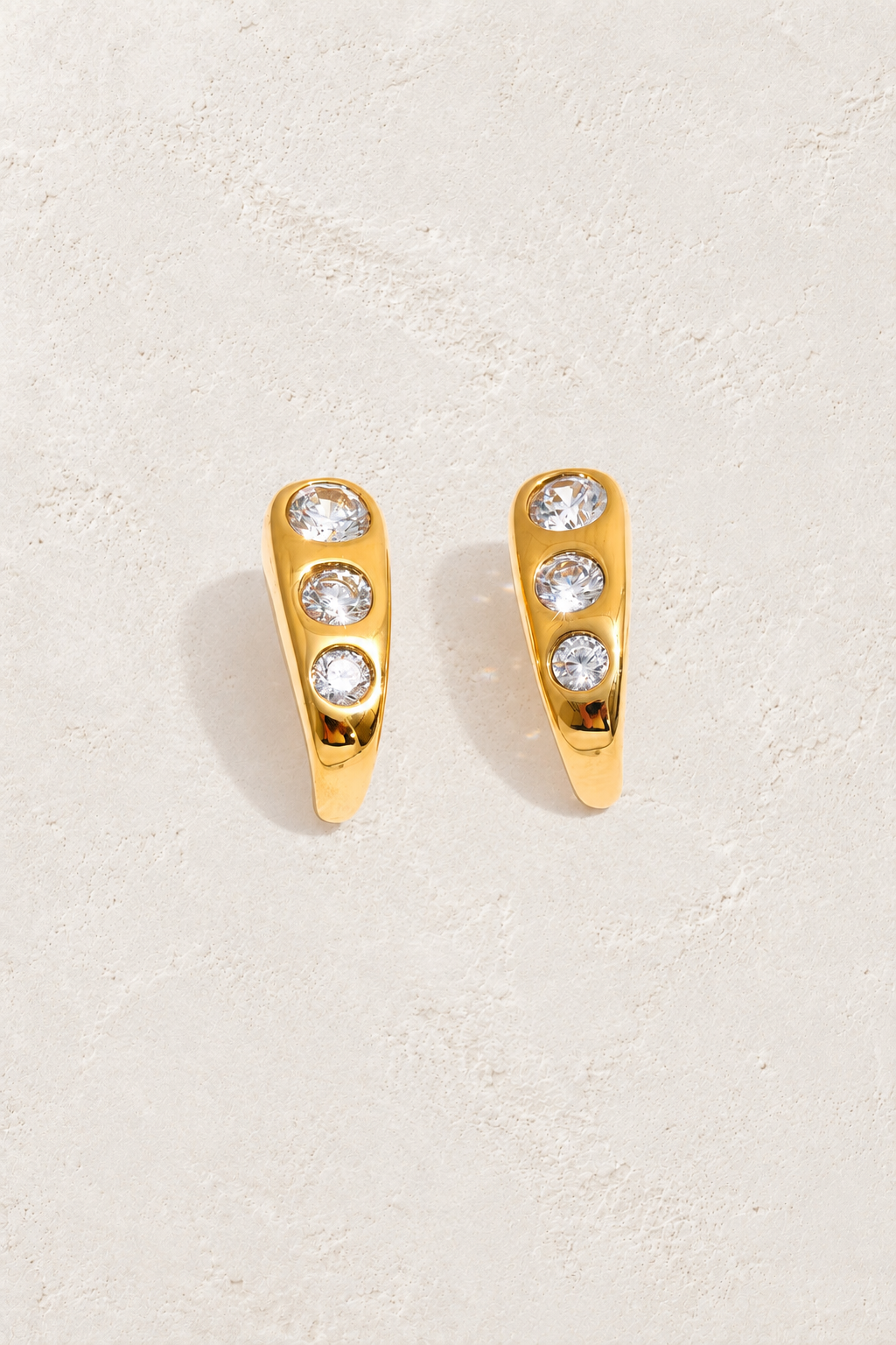 Gold Tapered Crystal Trio Earrings — original cream plaster hero