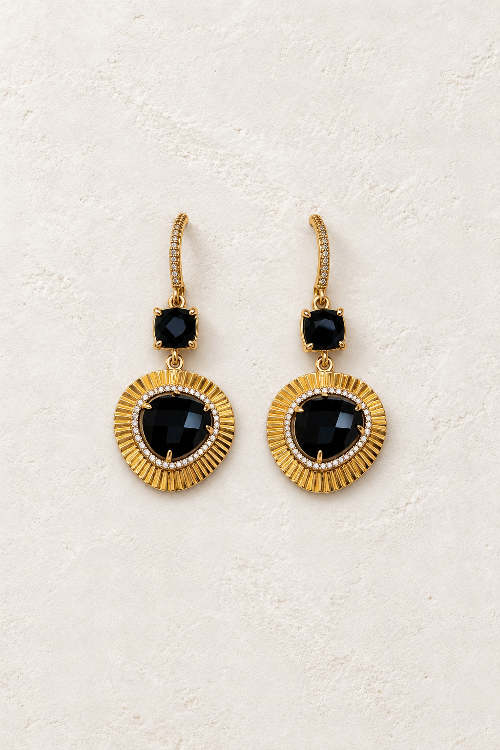Valencia Black Obsidian Halo Drop Earrings on cream textured background