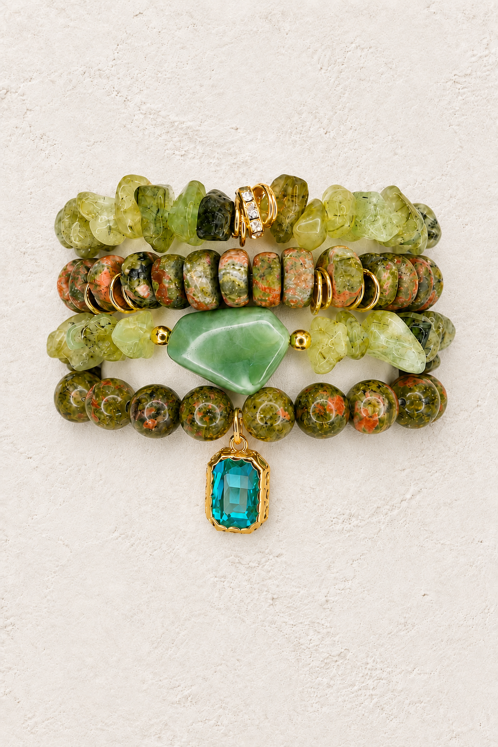 Woodland Soul 4-piece elastic bracelet stack on warm textured background