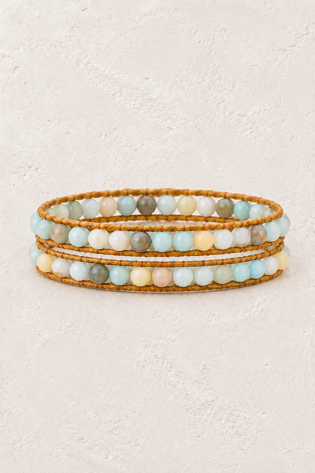 Handmade Amazonite Mixed Natural Stone Wrap Bracelet on the Boho & Mala warm-white textured background