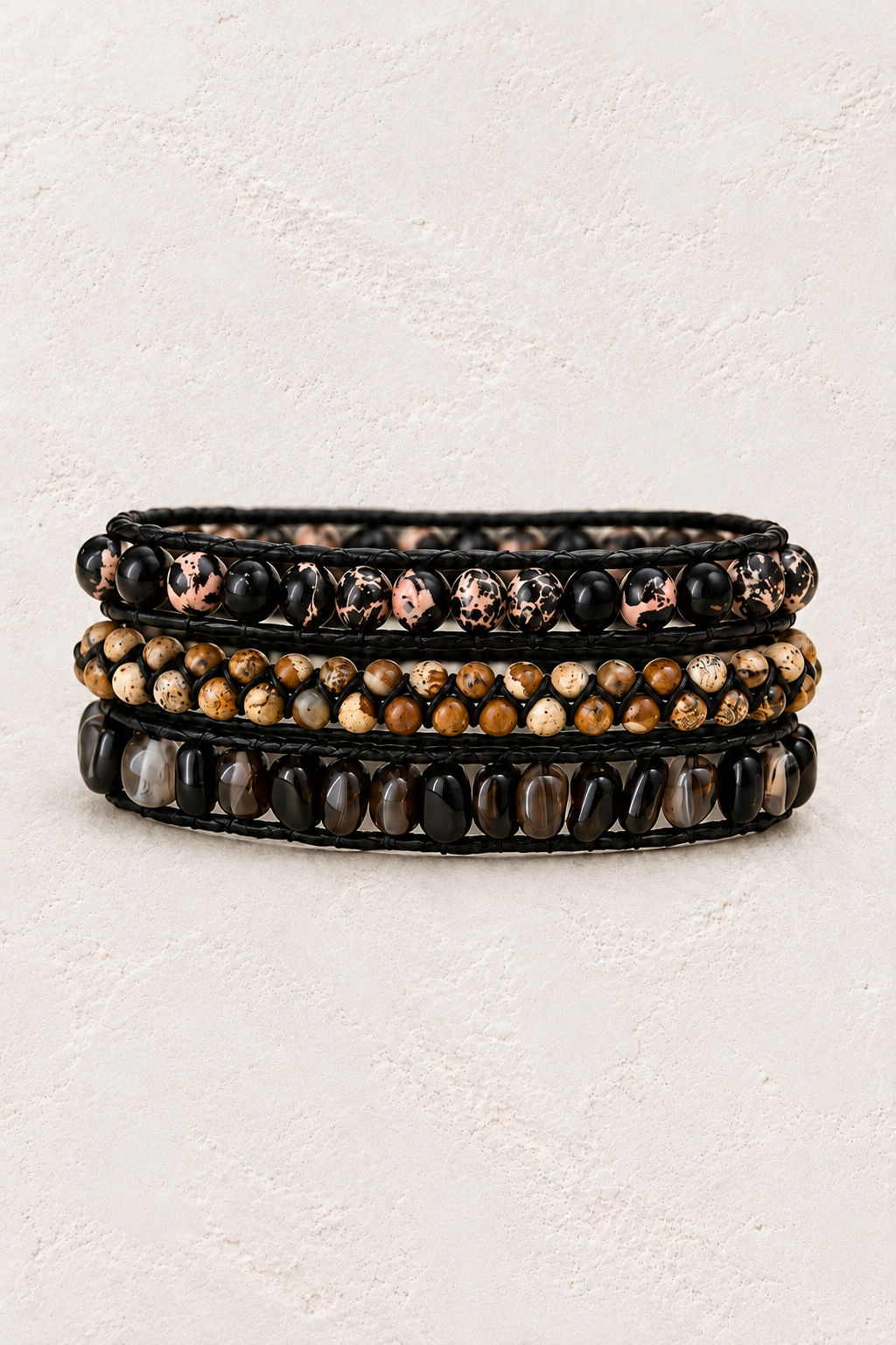 Handmade Black Onyx & Black Agate Mixed Natural Stone Wrap Bracelet on the Boho & Mala warm-white textured background