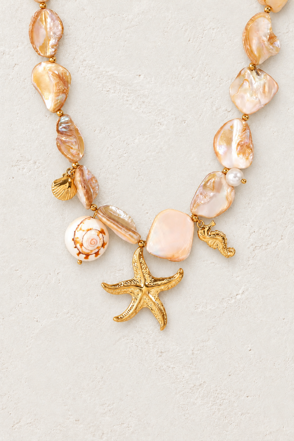 Marina Pearl & Starfish Necklace – Coastal Statement Necklace on the Boho & Mala cream stone hero background