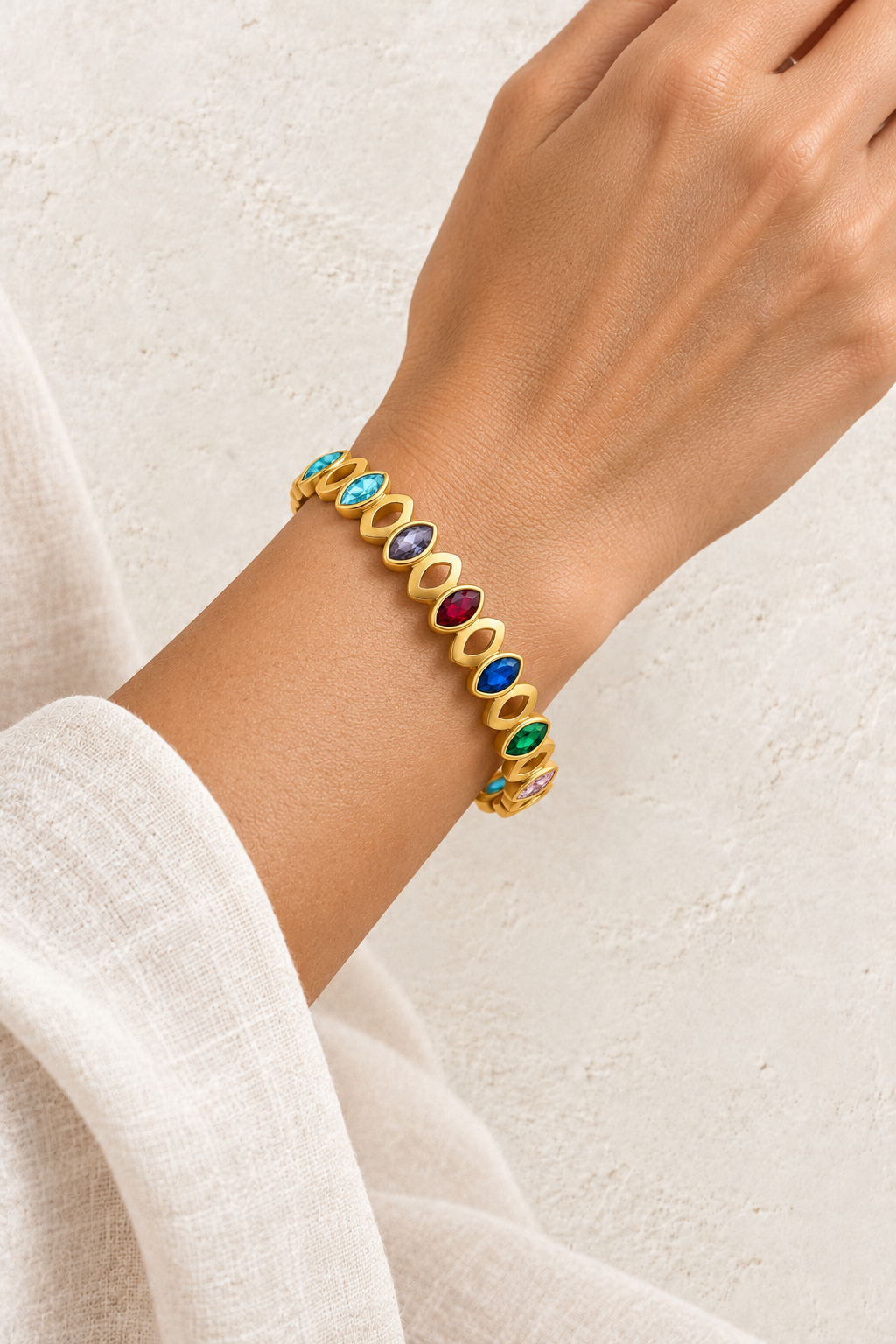 
                  
                    Model wearing Gold Marquise Rainbow Crystal Bangle | Waterproof
                  
                