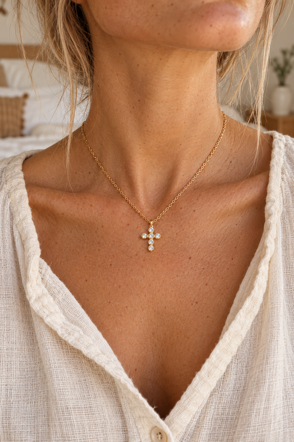 
                  
                    Gold zircon cross necklace worn on model – styling illustration
                  
                